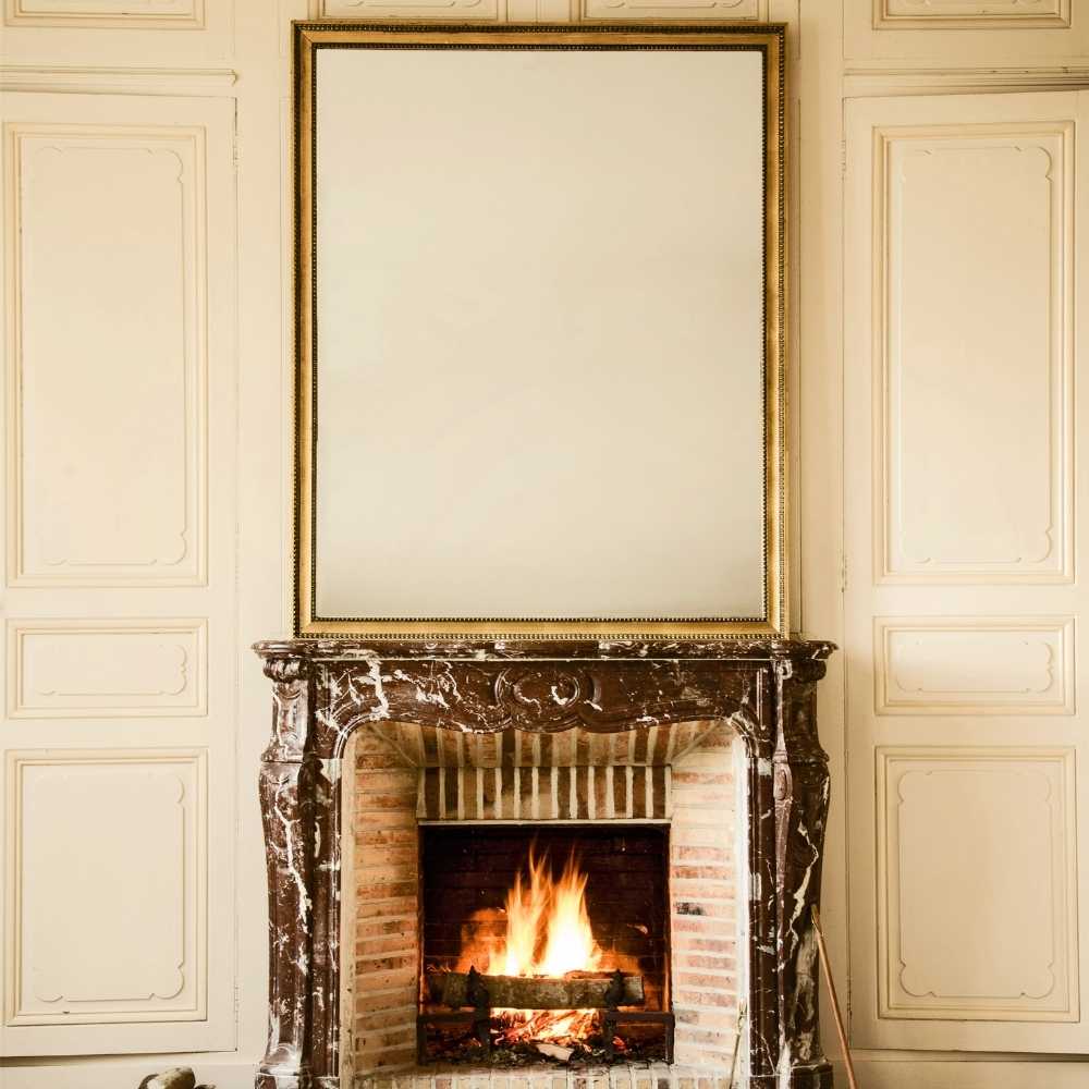 Antique Mirror over a Fireplace